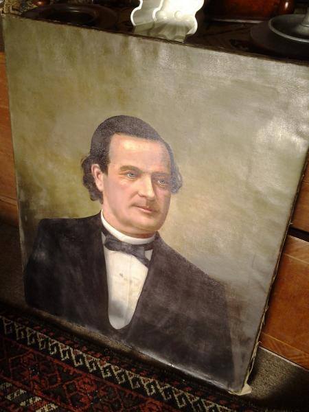 2006 Ford E350 - An oil painting of a man in formal attire is displayed leaning against furniture.