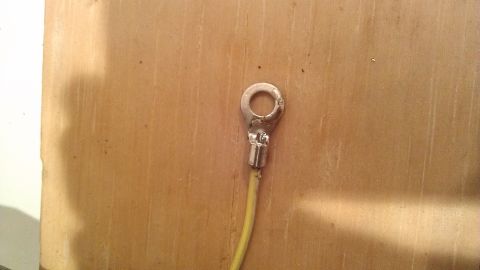 1990 Ford Bronco - A close-up view of an electrical connection, likely a part of a vehicle's wiring harness.