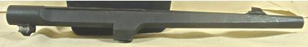 1995 Ford Bronco - A close-up view of a gun barrel, showing the front sight and mounting hardware.