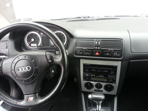 2002 Volkswagen Jetta - The interior of a car is shown, focusing on the steering wheel and dashboard area.