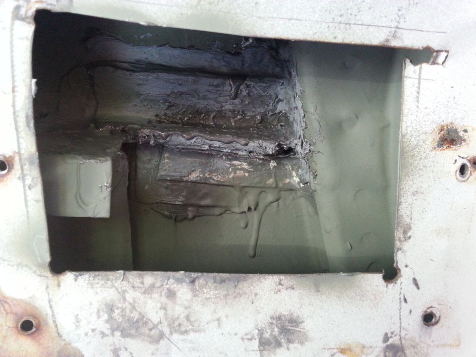 Interior shot of the b-pillar...it doesn't look pretty but hopefully the rust won't come back any time soon.