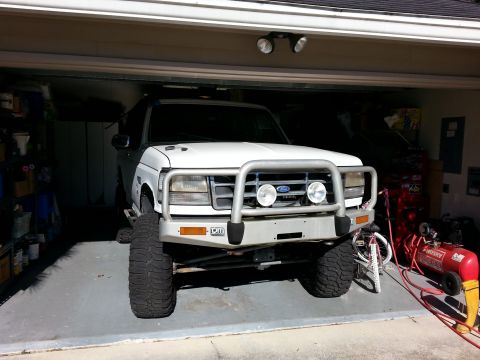 1992 Ford Bronco - had to move the Bronco into the garage to paint. it was still a tight squeeze, even after losing 20lbs of air pressure in each tire .