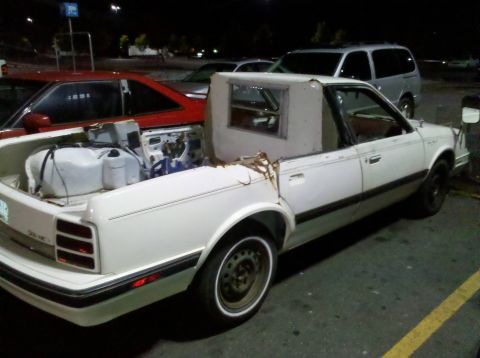 1972 Ford Ranchero - This modified coupe utility has its bed filled with fuel tanks and exposed engine parts.