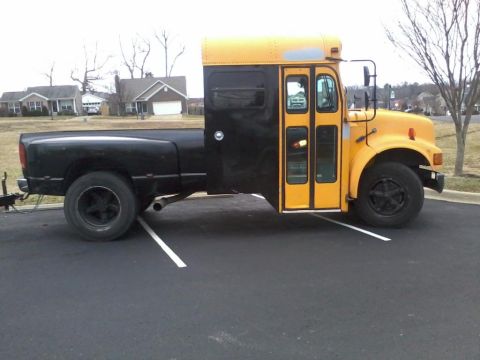 1972 Ford Ranchero - A custom vehicle combines a school bus front with a pickup truck bed.