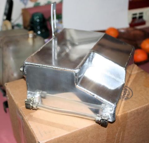 1976 Ford Ranchero - This aluminum radiator overflow tank features a polished finish and clear tubing with fittings, likely for an aftermarket automotive applic…