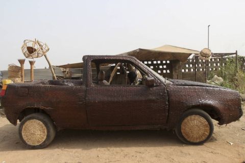 1972 Ford Ranchero - This unique vehicle appears to be constructed from woven materials, unusual basket-like wheels and decorative elements.