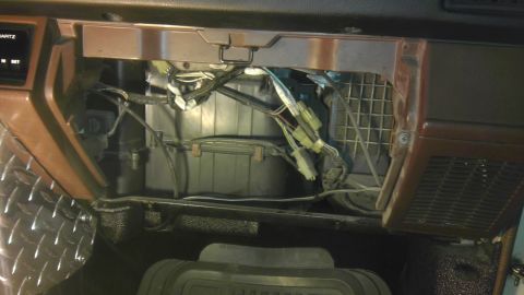 1985 Toyota 4Runner - Interior view of 1985 Toyota 4Runner dashboard, revealing exposed HVAC system components and wiring.