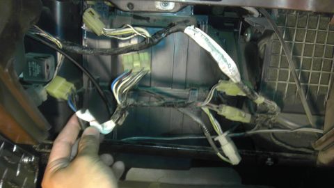 1985 Toyota 4Runner - Close-up of a vehicle's A/C wiring harness, showing multiple connectors and wires.