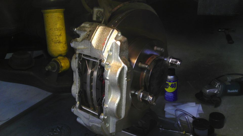 Brake caliper and rotor with yellow shock absorber