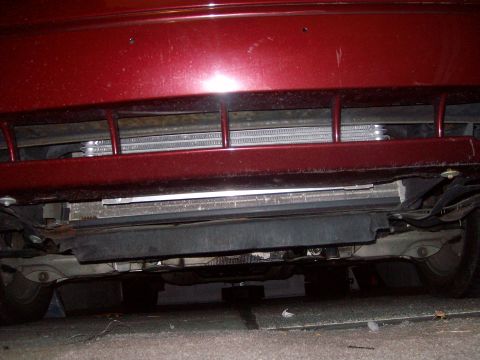 2004 Ford Crown Victoria - Underside view of a 2004 Ford Crown Victoria's front bumper and radiator.