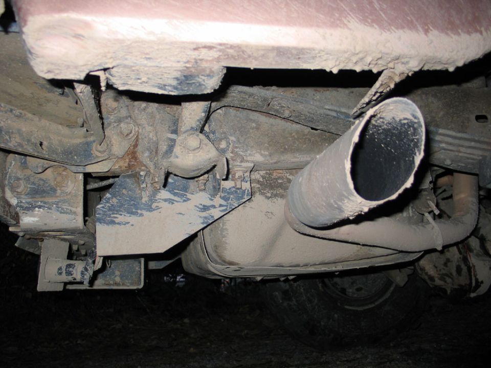Exhaust pipe and undercarriage of a vehicle