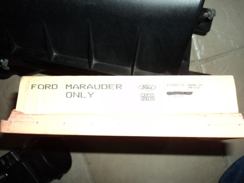 2004 Mercury Grand Marquis - Air filter box labeled 'Ford Marauder Only' with a Mann filter logo and part number.