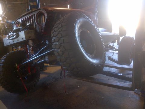 1985 Jeep CJ7 - Customized 1985 Jeep CJ7 front end with oversized tires and aftermarket bumper.