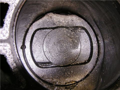 1993 Ford Bronco - This is a close-up view of an engine cylinder, showing signs of wear and damage.