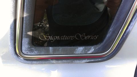 1996 Lincoln Town Car - Chalky and rough rear windows..