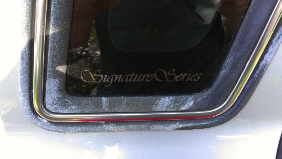 Chalky and rough rear windows..