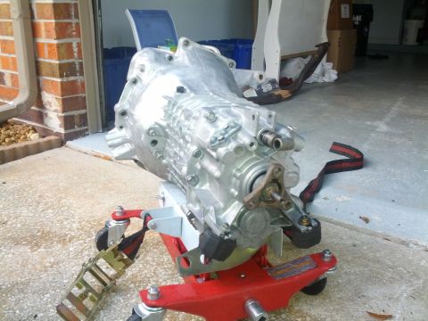 1989 BMW 3 Series - Transmission on a stand, likely for repair or replacement.