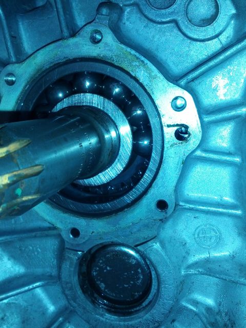 1989 BMW 3 Series - A close-up view of a transmission bearing assembly, showing the internal ball bearings and shaft.