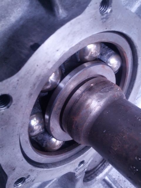 1989 BMW 3 Series - Ball bearing assembly with a metal shaft, likely from a transmission or differential.