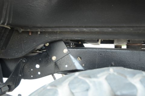 1979 Ford Bronco - Close-up view of the underbody chassis and suspension components, a SuperMotors logo at the bottom right.