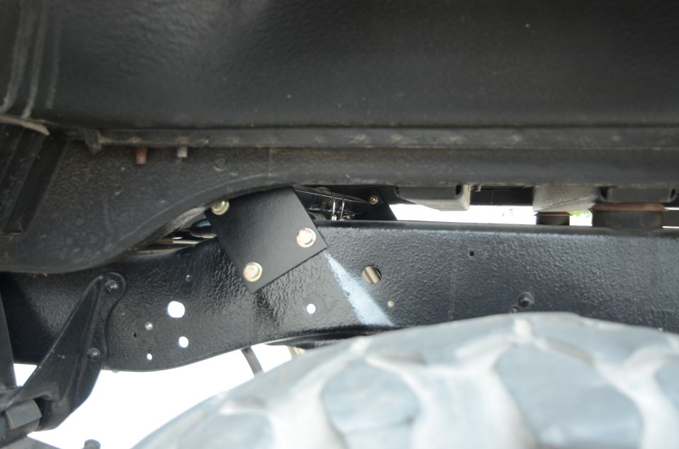 Underbody chassis and suspension components with SuperMotors logo