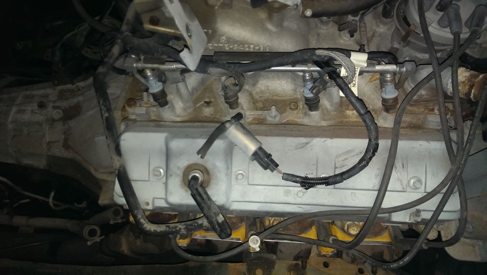 Engine bay with fuel injectors and wiring