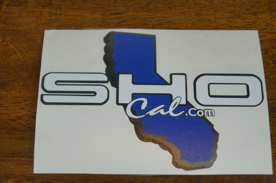 Sticker with SHO and California outline, reads Cal.com