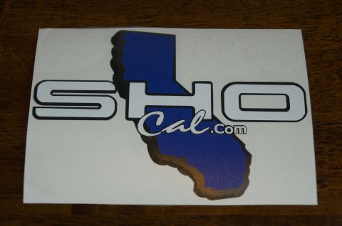 1993 Ford Taurus - A sticker displays the text SHO and the outline of California with Cal.com.
