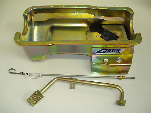 65 Mustang - This "T" style rear sump oil pan is for Ford 289-302 blocks in Fox Body Mustangs. It has a 7-1/2" deep by 8" long by 13-1/2" wide sump and a 7 quart system capacity.      
 * Retains Stock Dept
  * Diamond Shape Road Race Baffle Assembly With
          Four Trap Doors
  * Crank Scraper
  * Removable Windage/Anti-Slosh Baffle
  * 1/2" NPT Temperature Bung
  * Provision For Our Pan Mounted Dipstick
  * Magnetic Drain Plug