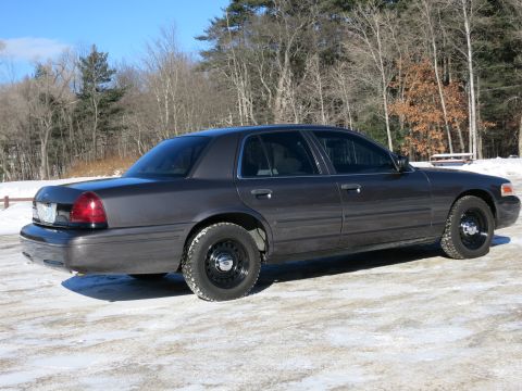 2001 Ford Crown Victoria - This 2001 Ford Crown Victoria is seen from a 3/4 front angle in a snowy environment.