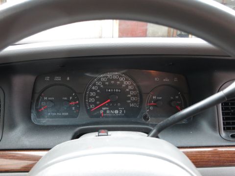 2001 Ford Crown Victoria - Interior view of a 2001 Ford Crown Victoria dashboard, showing the odometer reading 141,109 miles.