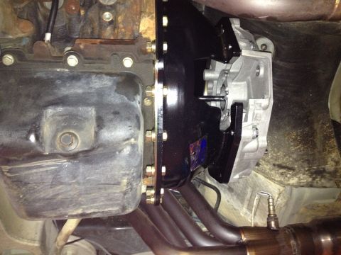 2004 Ford Crown Victoria - Underside view of engine and transmission components, possibly indicating a drivetrain modification.