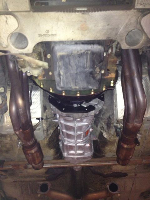 2004 Ford Crown Victoria - Underbody view of a vehicle's transmission and exhaust system, possibly indicating a modification or swap.