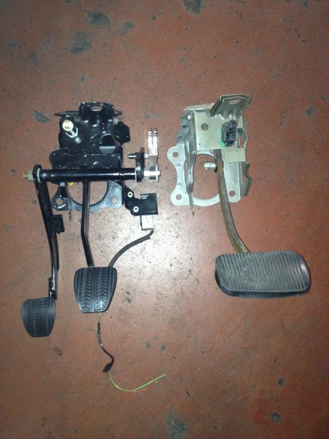 2004 Ford Crown Victoria - Two different car pedal assemblies are shown, one with a clutch, brake, and accelerator, the other with just brake and accelerator.