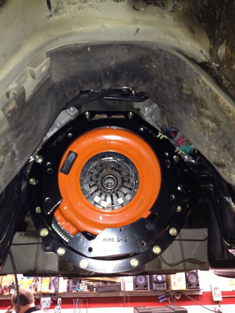 2004 Ford Crown Victoria - Close-up of a vehicle's clutch and transmission assembly, indicating a mechanical modification.