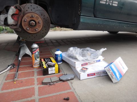 1993 Ford Taurus - Gathering brake parts and tools for a brake upgrade or replacement project.