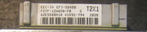 1990 Ford Bronco - Electronic control unit labeled EEC-IV EFI-SD48B, part number F2TF-12A650-PB.