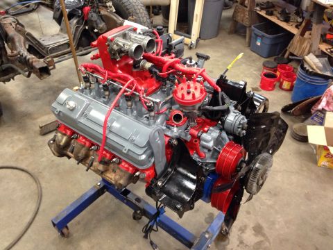 1993 Ford Bronco - Engine assembly on a stand in a workshop environment.