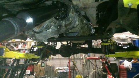 1996 Ford Bronco - Undercarriage view of a 1996 Ford Bronco, highlighting the transmission and drivetrain components.