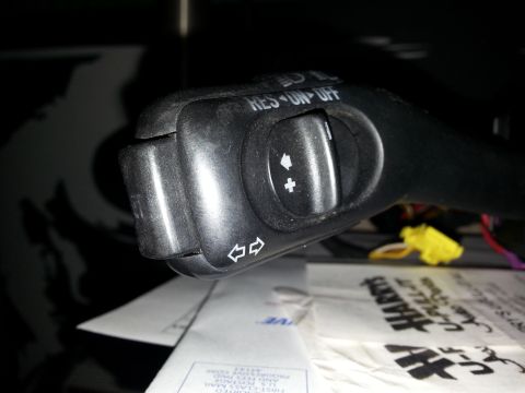 2002 Volkswagen Jetta - Close-up of a black cruise control stalk, RES ON OFF buttons and directional arrows.
