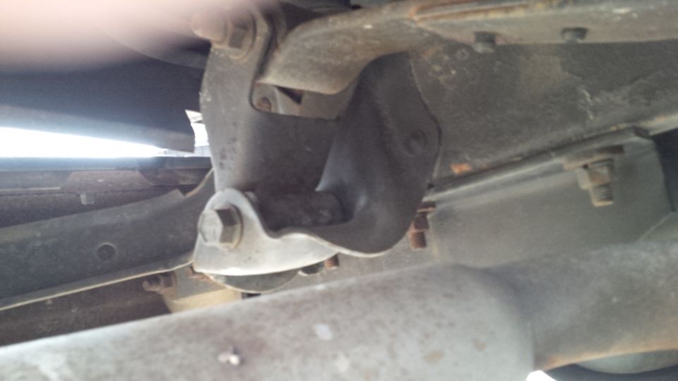 Close-up of vehicle suspension components and frame