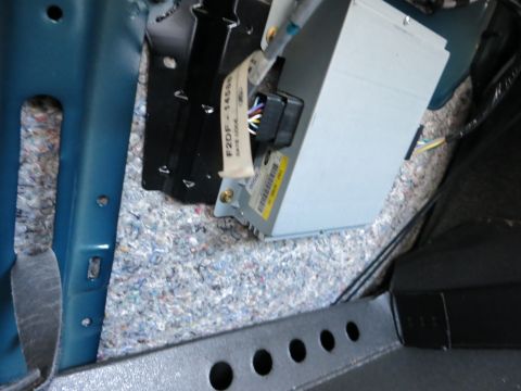 1991 Ford LTD Crown Victoria - Close-up of an electronic control unit with visible wiring and part number label.
