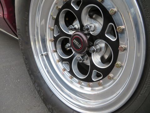 1992 Ford Crown Victoria - A Weld Racing wheel is shown in detail, mounted on a vehicle.