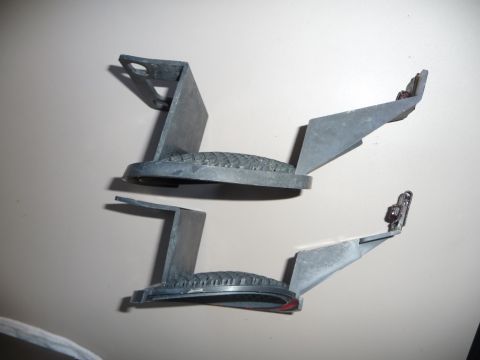 1993 Mazda MX-3 - These appear to be side marker light housings for a vehicle, not a telescopic mast.