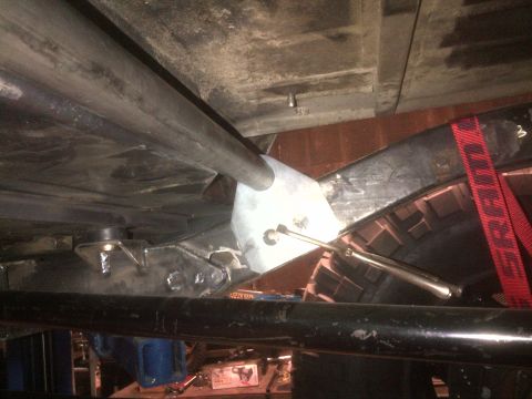 1985 Jeep CJ7 - Custom suspension components are visible on the underbody of this vehicle.