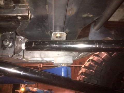 1985 Jeep CJ7 - Close-up of the undercarriage and suspension system on a 1985 Jeep CJ7.