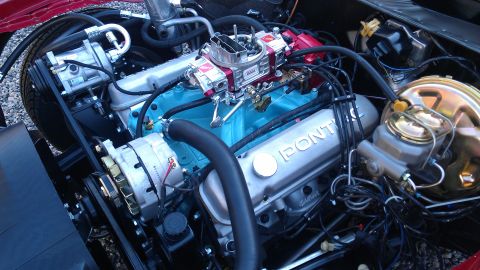 1972 Pontiac Trans Am - The engine bay features a Pontiac V8 with a prominent carburetor and intake manifold.