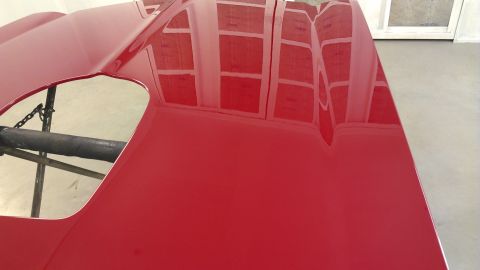 1972 Pontiac Trans Am - Close-up of the red hood and scoop on a 1972 Pontiac Trans Am.