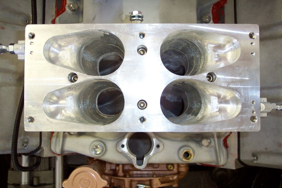 Supercharger intake manifold with four intake runners