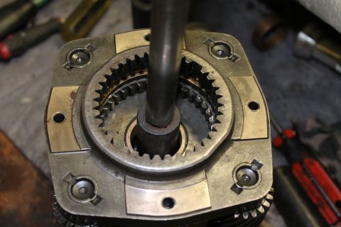 1995 Ford Bronco - A detailed view of a transfer case component, likely undergoing assembly or repair.